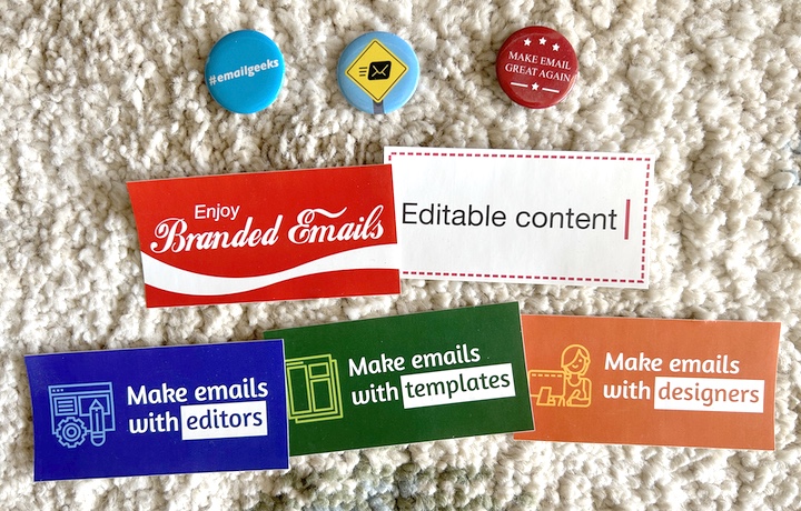 Photo of #emailgeeks stickers and pins
