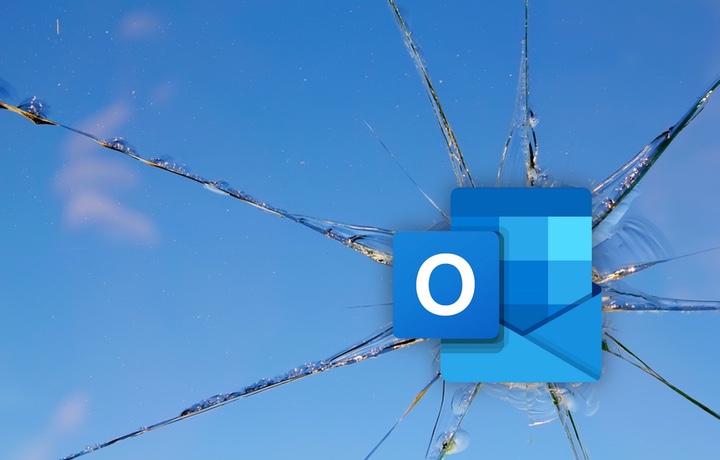 Outlook logo on top of a broken window.